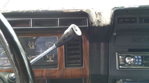 1984 Ford Bronco - Interior view of a 1984 Ford Bronco dashboard, gauges and the gear shifter.