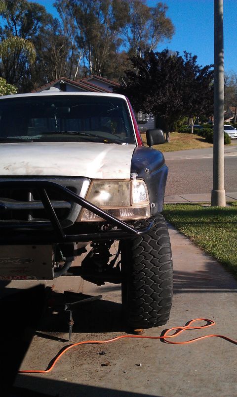 1992 Ford Ranger - Front view of a 1992 Ford Ranger modified with a custom bumper and large off-road tires.