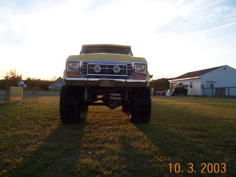 1978 Ford Bronco - This lifted 1978 Ford Bronco is presented from a front-facing perspective, its substantial tires and elevated chassis.