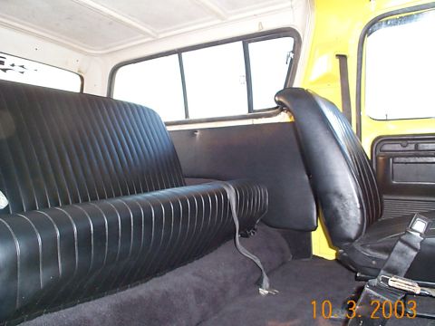 1978 Ford Bronco - Interior view of a 1978 Ford Bronco, highlighting the bench and bucket seats.