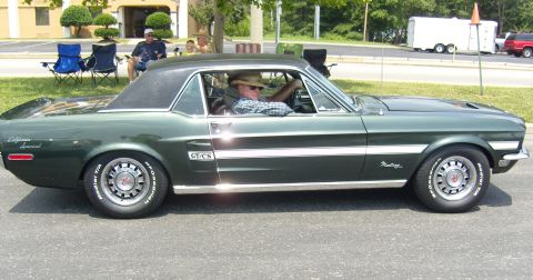 2007 Ford Mustang - A green 1967 Ford Mustang GT/CS, a California Special model, is seen from the side during a car show.