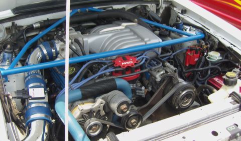 2007 Ford Mustang - Customized engine bay an MSD ignition system and aftermarket intake piping.