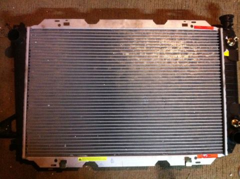 1989 Ford Bronco - A vehicle radiator is shown, likely for replacement or repair.