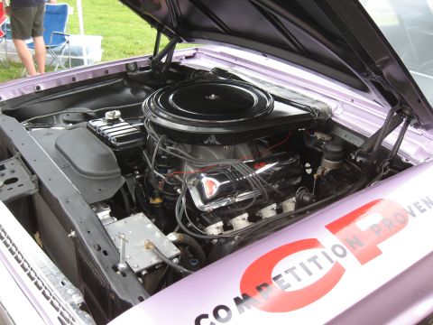 1968 Shelby GT500 - Engine bay details of a classic car with 'COMPETITION PROVEN' graphics on the fender.