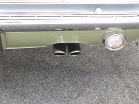 1968 Shelby GT500 - Close-up of the rear end of a 1968 Shelby GT500, showing its dual exhaust and taillight.