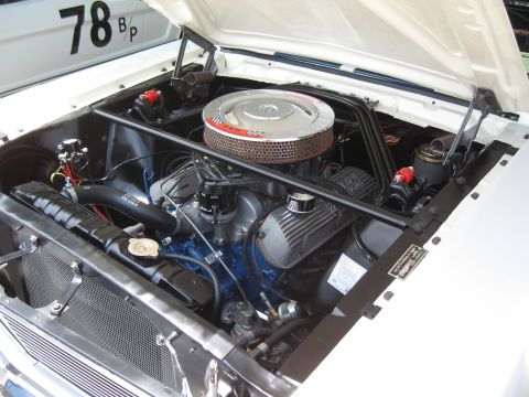 1968 Shelby GT500 - Engine bay of a 1968 Ford Mustang, showing the V8 engine and associated components.