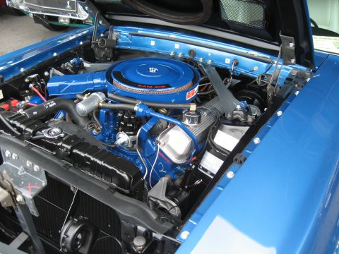 1968 Shelby GT500 - The engine bay of a blue 1968 Shelby GT500, its Ram Air cleaner and vibrant blue components.