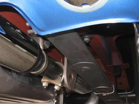 1968 Shelby GT500 - Underside view of a vehicle's exhaust system and suspension components, with visible text from Supermotors.net.