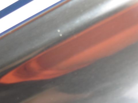 1968 Shelby GT500 - Close-up of a red taillight and chrome trim, with the Supermotors logo visible at the bottom.