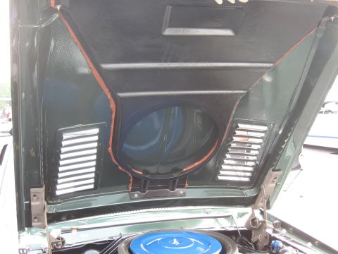 1968 Shelby GT500 - The underside of a 1968 Shelby GT500 hood reveals vents and the air cleaner assembly.