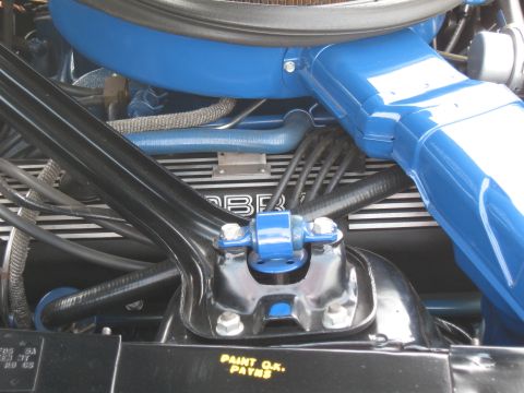 1968 Shelby GT500 - Close-up of a 1968 Shelby GT500 engine bay, showing the 'COBRA' engine detail and inspection markings.
