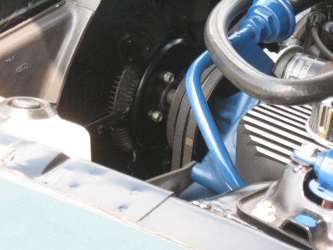 1968 Shelby GT500 - The engine bay features blue painted components and a visible fan pulley system.