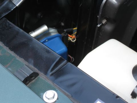 1968 Shelby GT500 - Visible engine bay components include a blue electrical part and a white fluid reservoir.