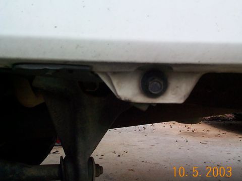 1992 Ford Bronco - Front frender mount that needs to be trimmed all the way down in order to mount the slider flush with the rocker panel.