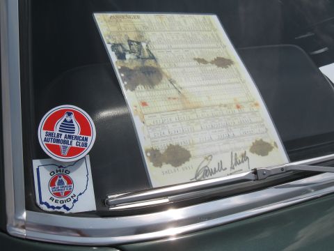 1968 Shelby GT500 - A document is displayed on the windshield, accompanied by a Shelby American Automobile Club sticker.