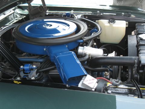1968 Shelby GT500 - The engine bay of a 1968 Shelby GT500 shows a blue air cleaner and intake system.