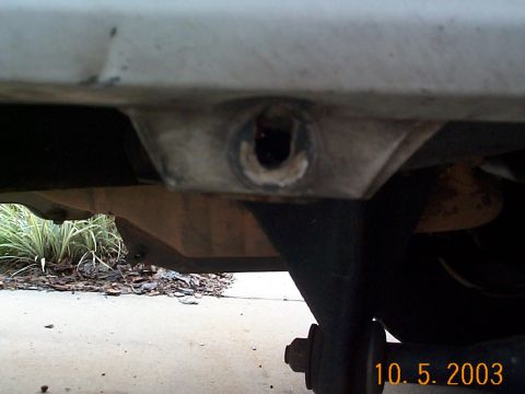 1992 Ford Bronco - Remove bolt that mounts fender, then use a 4 inch grinder to remove the metal where the mount originally was.