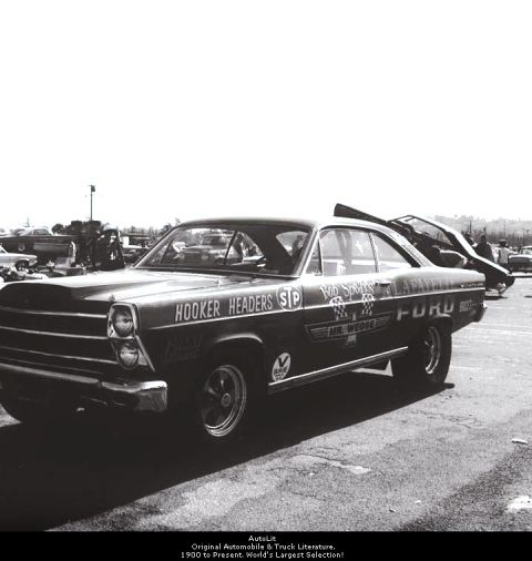 1967 Ford Fairlane - A 1967 Ford Fairlane, likely a drag racer, is seen with prominent "Hooker Headers" and "STP" branding.