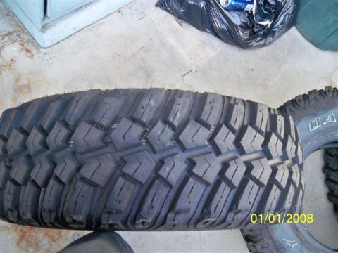 1992 Jeep Wrangler - A close-up view of a tire with aggressive tread pattern. The date 01/01/2008 is visible.