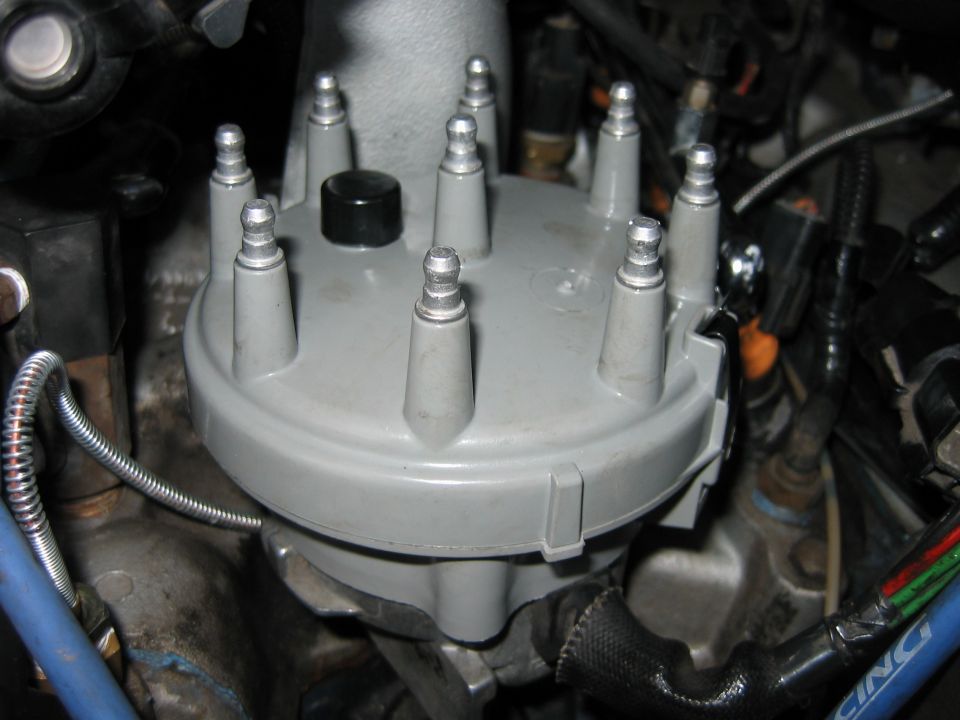 Distributor cap with eight spark plug wire posts