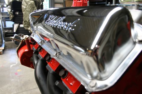 1973 Ford Ranchero - Close-up of a chrome Edelbrock valve cover on a V8 engine.