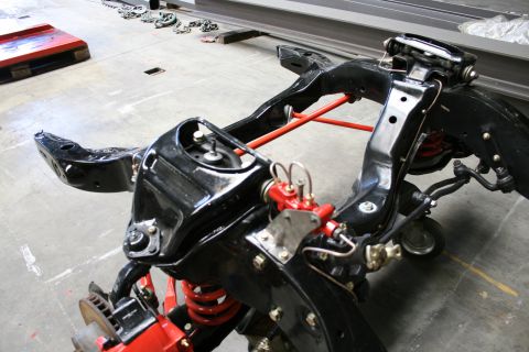1973 Ford Ranchero - Close-up view of a vehicle's chassis and suspension system, likely during a rebuild.