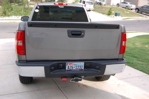 2007 Chevrolet Silverado 1500 - This 2007 Chevrolet Silverado 1500 is seen from the rear, displaying its chrome bumper and license plate.