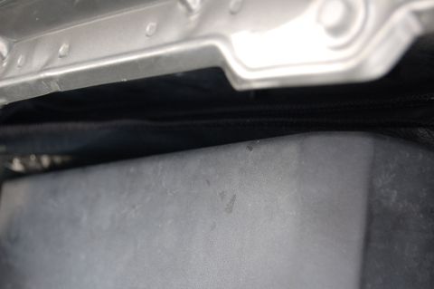 2007 Chevrolet Silverado 1500 - Underside view of engine bay components, showing metal and plastic parts.