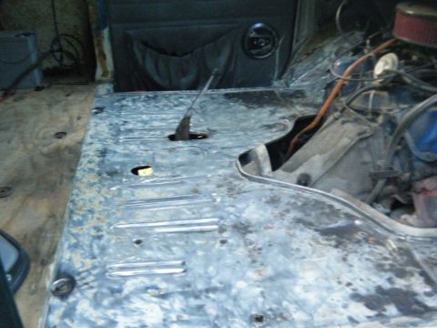 1981 Ford E350 - Van interior with exposed metal floor and engine components visible.