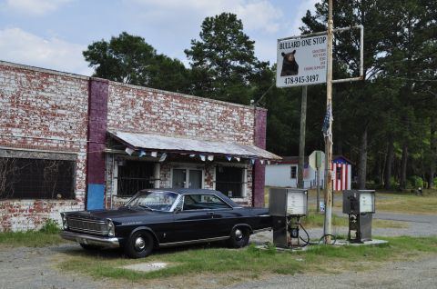 1965 Ford Galaxie - A classic 1965 Ford Galaxie sits at vintage gas pumps in front of a rustic general store.