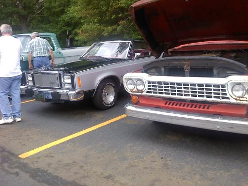 Silver and black coupe front grille and headlights, 1977 model year
