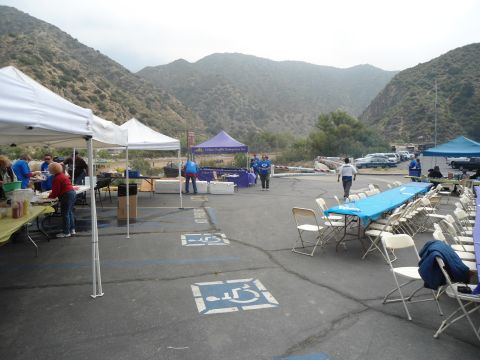 1994 Ford Bronco - An outdoor gathering is set up with tents and tables in a mountainous area.