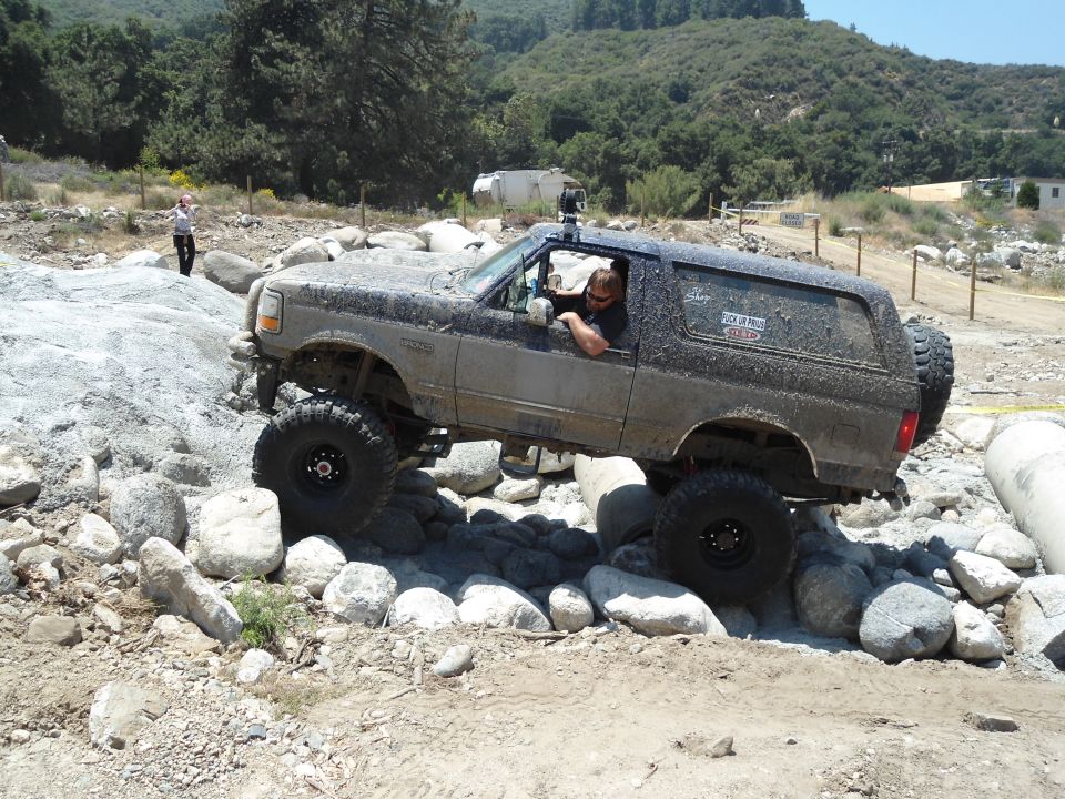1994 Ford Bronco navigating rocky terrain