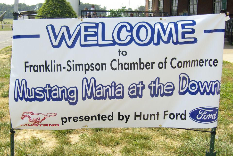 Photo of a Mustang Mania at the Downs welcome banner