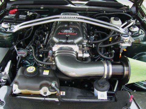2007 Ford Mustang - Engine bay view of a Ford Racing supercharged engine, likely from a Mustang.