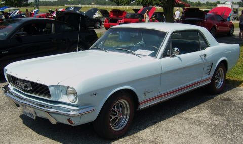 2007 Ford Mustang - Light blue 1965 Ford Mustang coupe parked at an outdoor car show.