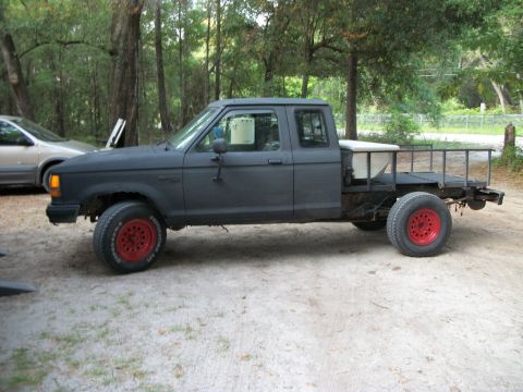 1994 Ford Explorer - This flatbed pickup truck does not appear to be a 1994 Ford Explorer.