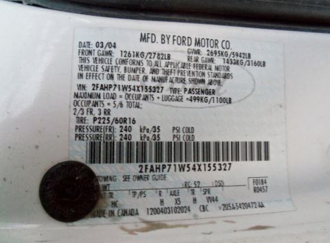 2000 Mercury Grand Marquis - Vehicle identification sticker shows manufacturing date of 03/04 and VIN 2FAHP71W54X155327.