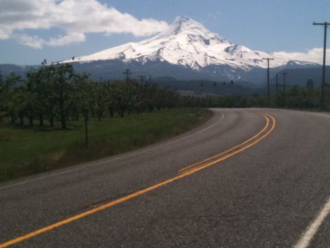 2005 Jeep Wrangler - A scenic view of a mountain and a road, likely taken during a drive through the countryside.