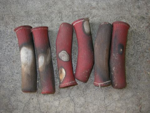 1990 Ford Bronco - Six used spark plug wire looms, showing signs of heat damage from engine proximity.