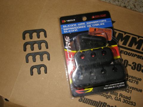 1990 Ford Bronco - Packaged and loose silicone wire separators for organizing spark plug wires.