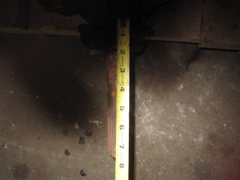measuring a splined metal shaft with a tape measure