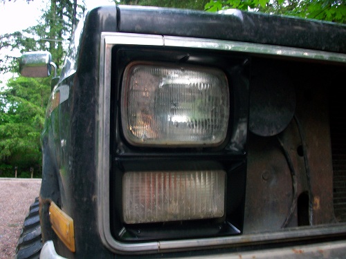 1983 Chevrolet C/K Pickup front corner with headlight and turn signal visible