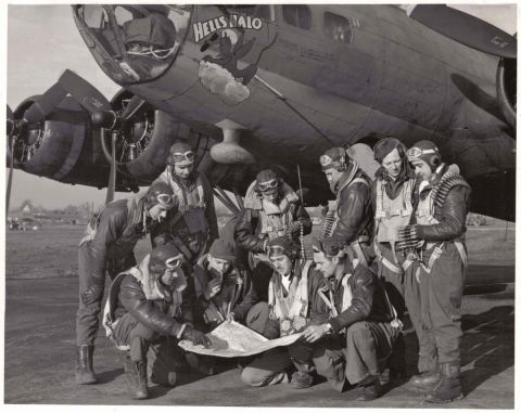 2000 Ford Crown Victoria - A bomber crew studies a map in front of their aircraft, which features "HELL'S ANGELS" nose art.