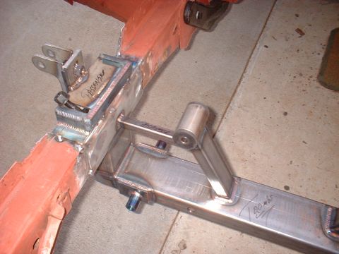 1964 Ford Fairlane - Close-up of a car's frame showing custom metalwork and handwritten labels.