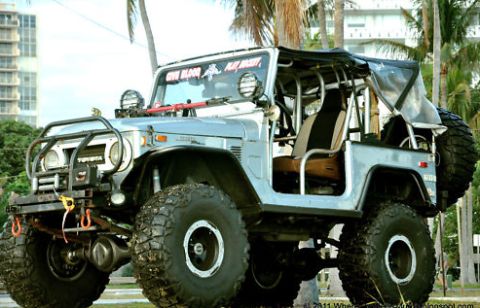1968 Ford Mustang - This modified Toyota Land Cruiser features a roll cage and oversized tires, ready for off-road adventures.