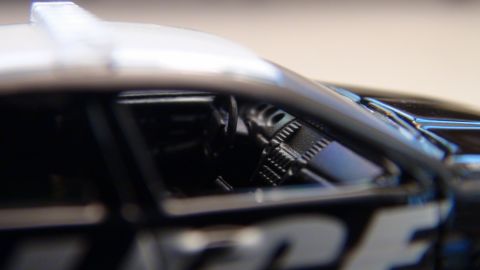 1993 Ford Taurus - Close-up view of a police car's interior, showing the dashboard and steering wheel.