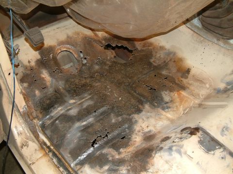 1983 Ford Bronco - The floor pan of this vehicle is heavily rusted and has several holes.