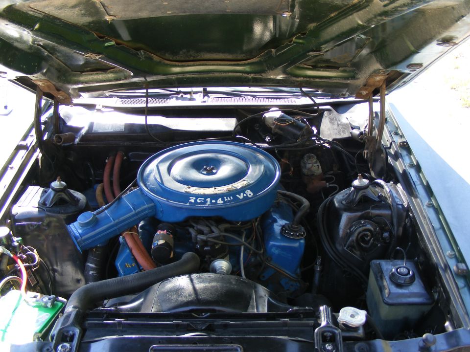 1971 Mercury Cyclone engine bay showing V8 engine with blue air cleaner and intake