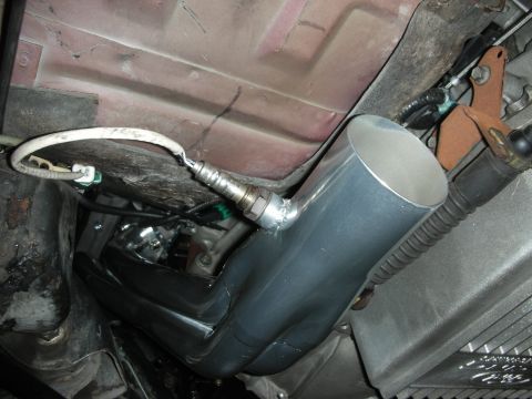1992 Ford Crown Victoria - Custom exhaust header and oxygen sensor installation under a vehicle.